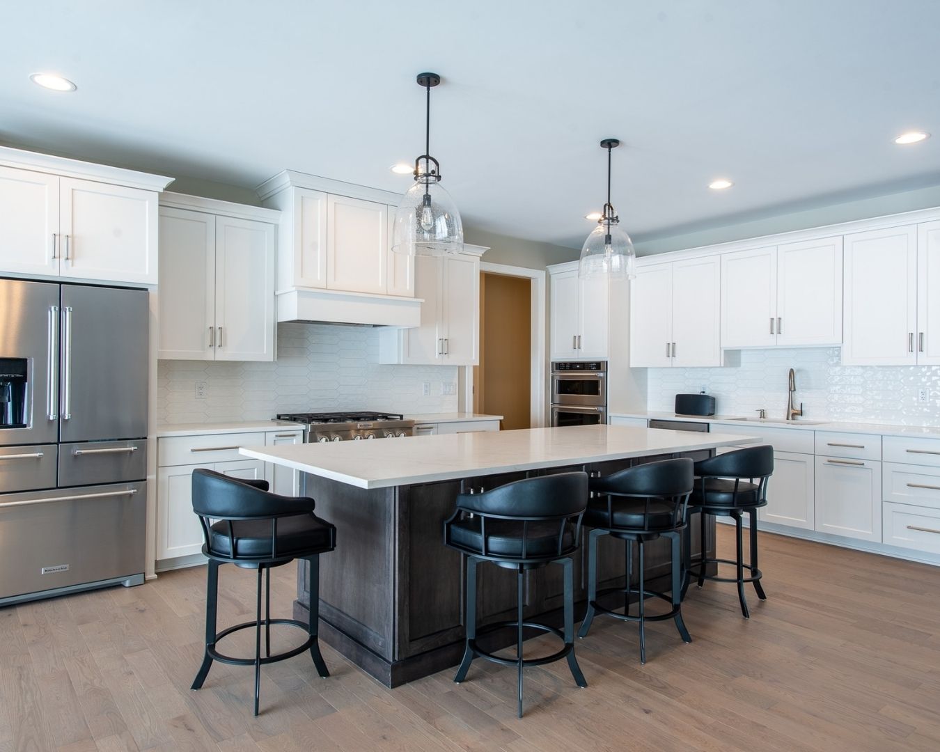 Hardwood flooring and kitchen backsplash
