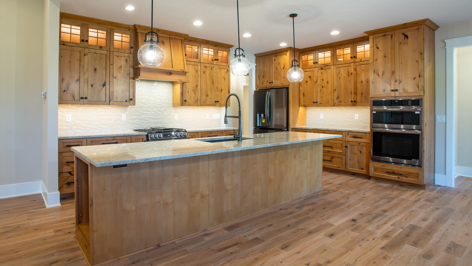 Hardwood flooring and kitchen backsplash