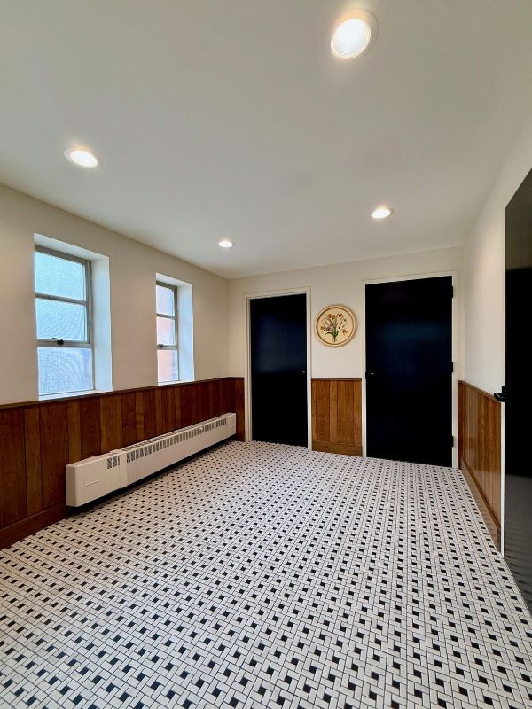 Retro mosaic tile flooring installed in renovated church interior at Church of Pickleball in Chicago Illinois